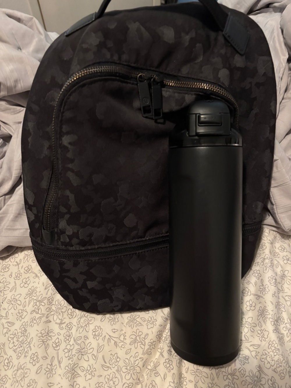 Hydrojug Ease20 24oz water bottle & Lululemon City Adventurer Black backpack 11L